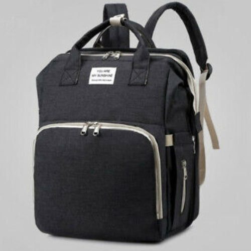 Convertible diaper bag attached to stroller showing versatile design and organization